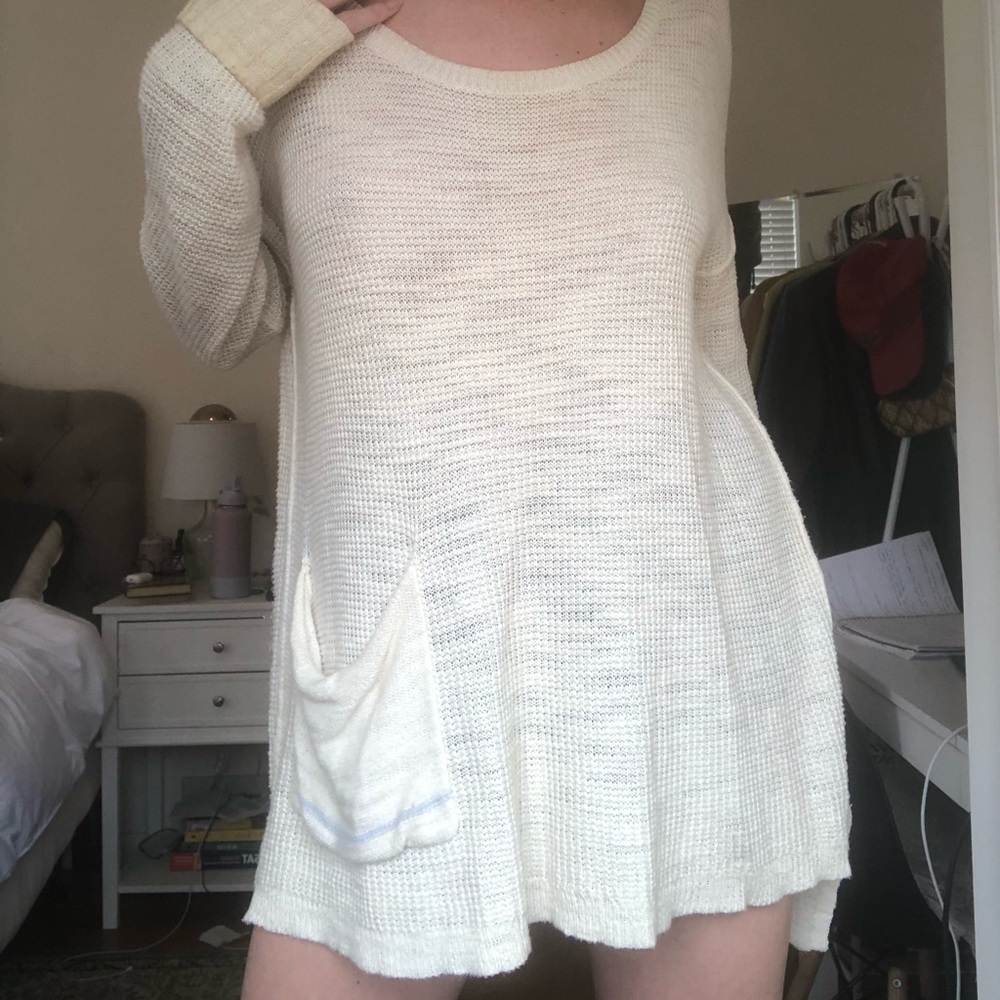 Anthropologie slouchy cream sweater with front pocket
